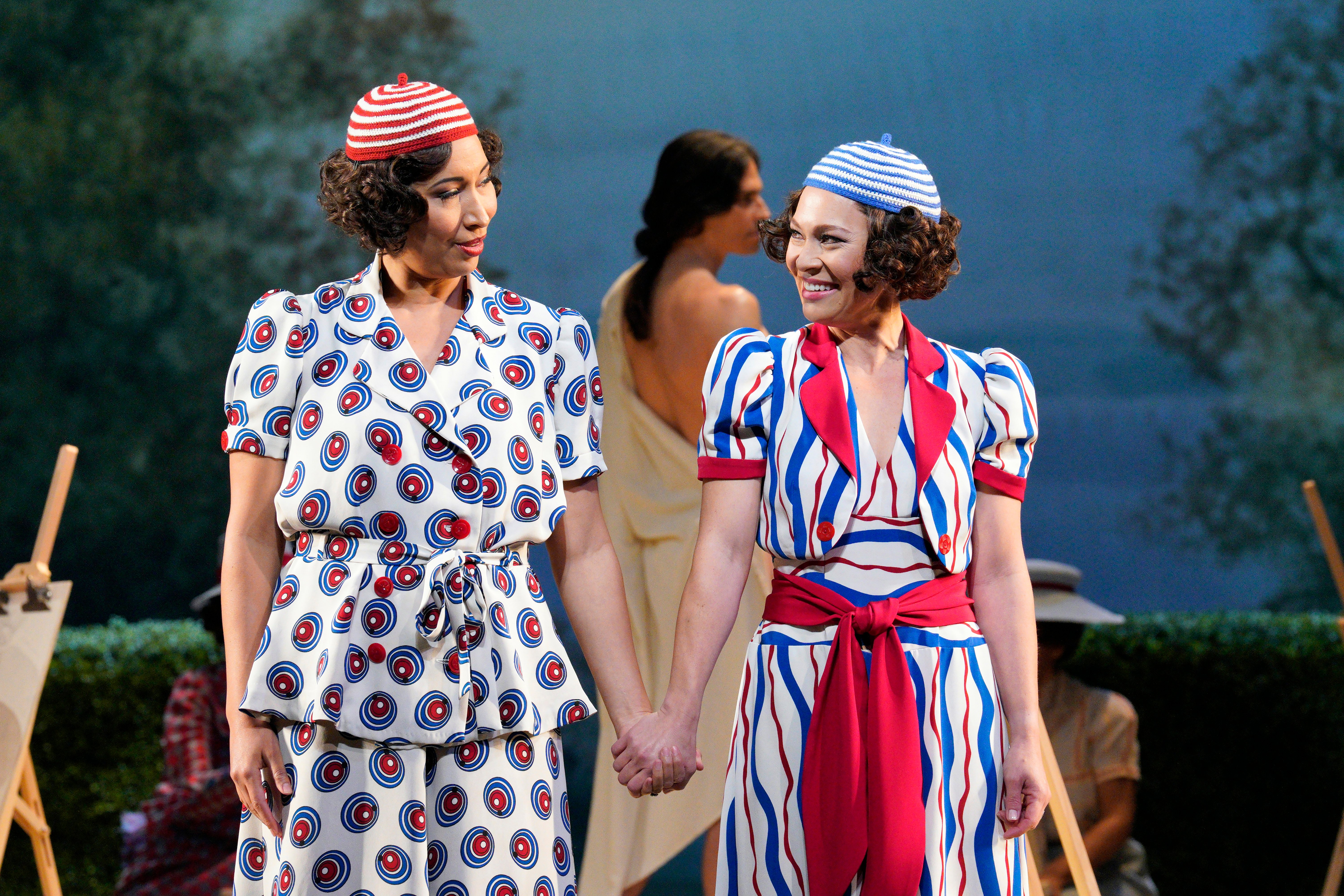 Two women  holding hands